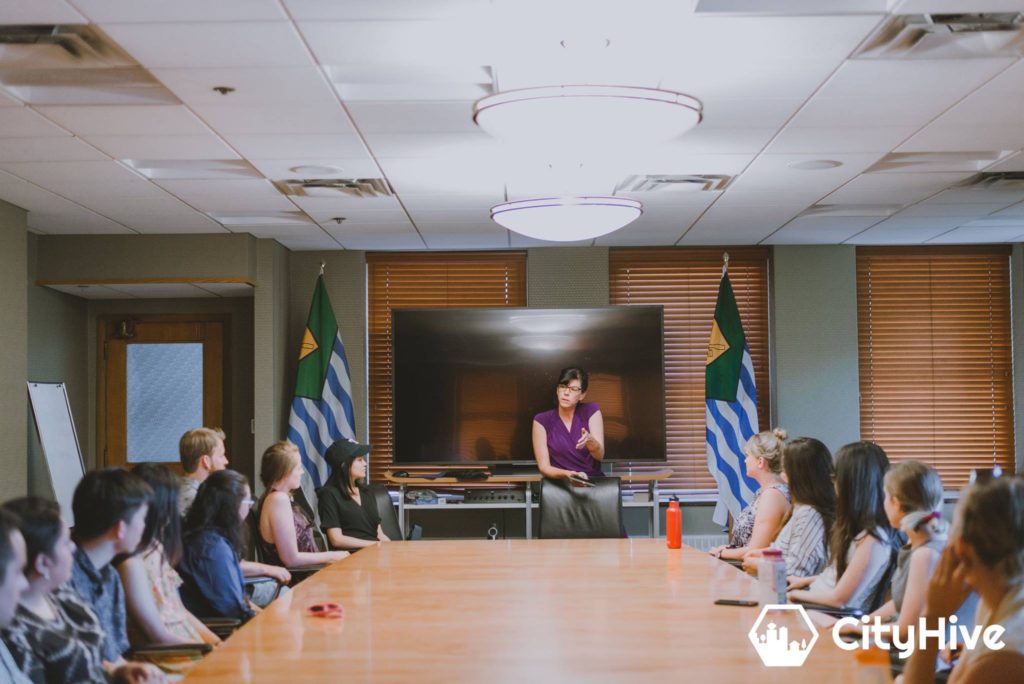 Photo of form Vancouver City Councillor Andrea Reimer speaker to a group of youth at Vancouver City Hall